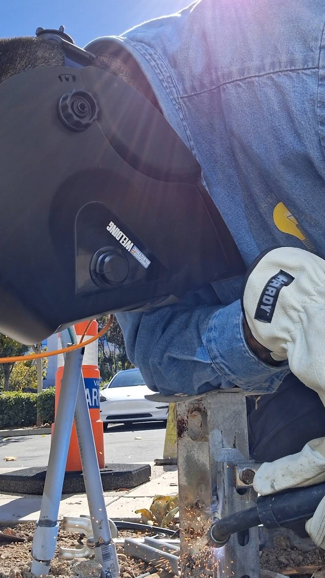 Cervantes Electric fabricating and welding a metal frame on site